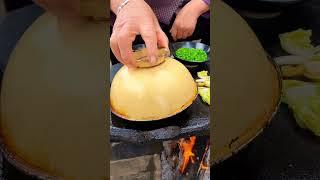 Tongguan Roujiamo Stir-fried cabbage on stone slab