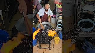 malaysia! A grandfather shows off his amazing cooking skills by making black bean noodles #shorts